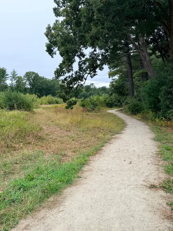 Open gravel path through the field near the ceremony