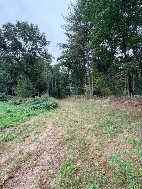 Mowed grass path connecting Cornstalk Lane to the trail
